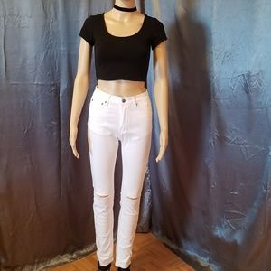 White busted knee jeans